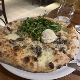 Maggie's Farm Wood-Fired Pizza signature dishes Pizza Funghi, Pesto Pasta, The Ellie, Lasagne, Maggie's Margherita.